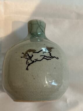 Small Chinese Celadon (crackle) vase stamped.